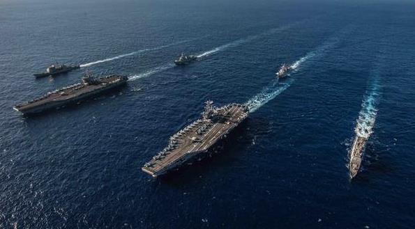 美军频频“秀肌肉”！战略核潜艇停靠关岛 三个航母群往中国周边聚拢